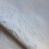 old linen sheet with monogram