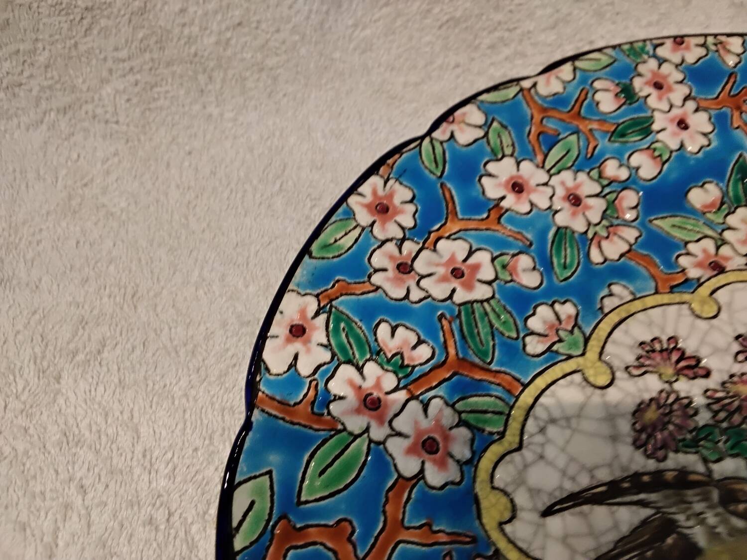 Longwy enamel plate with cartouche of 2 birds and apple blossoms, d188