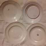Set of four retro fruit and flower flat plates from Moustiers...