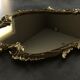 Miroir en bronze doré style rocaille 68 x 42 cm