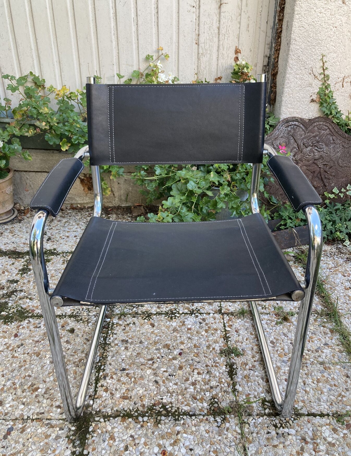Vintage armchair in black leather