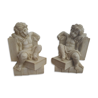 Angel bookends sitting in stone art deco 1950