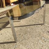 Elliptical coffee table circa 1970 in chromed metal and smoked glass