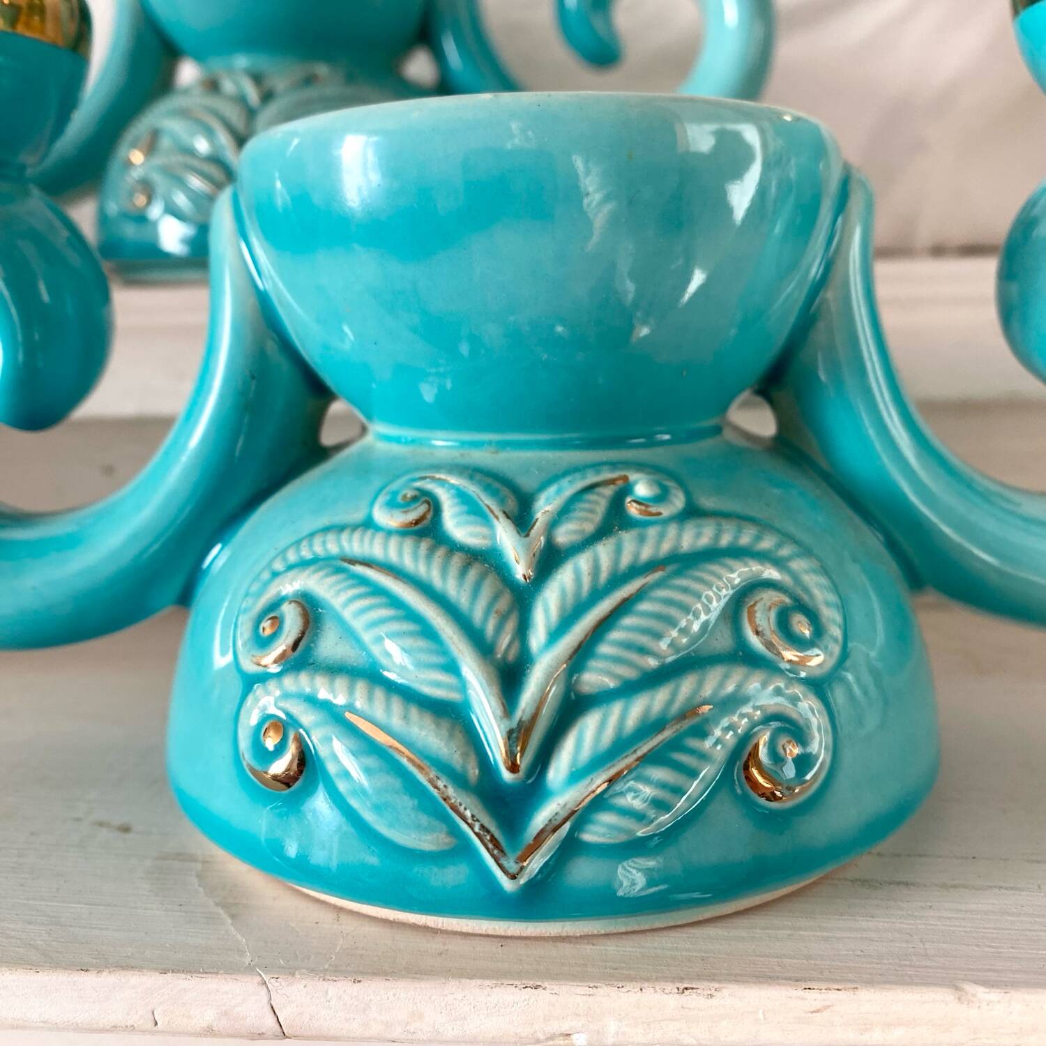 Pair of turquoise and gold double candlesticks