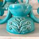 Pair of turquoise and gold double candlesticks