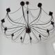 Lustre 12 branches métal effet rouille