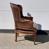 Fauteuil en rotin avec siège en cuir marron