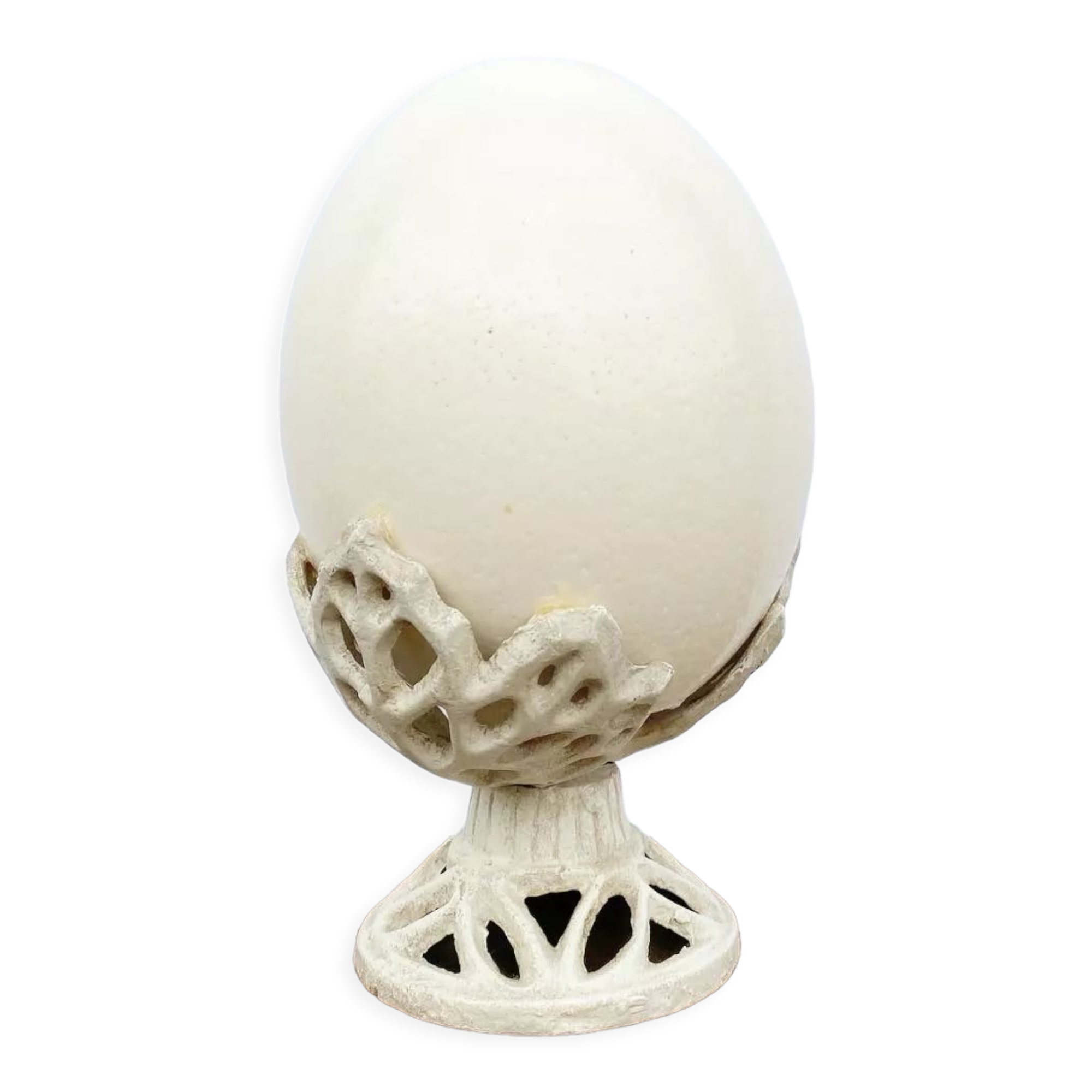 Ostrich egg on pedestal