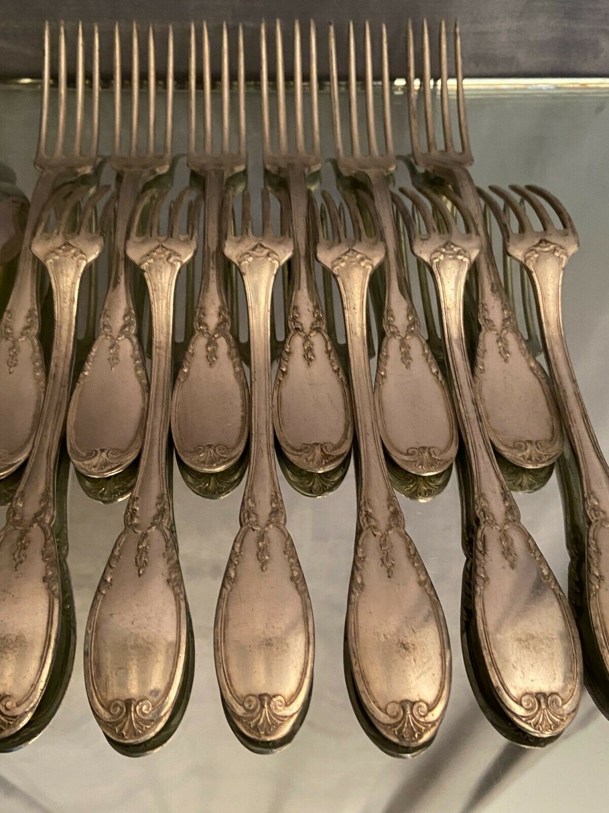 12 forks and 12 spoons in Louis XVI style metal