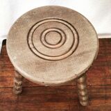 Turned wooden milking stool