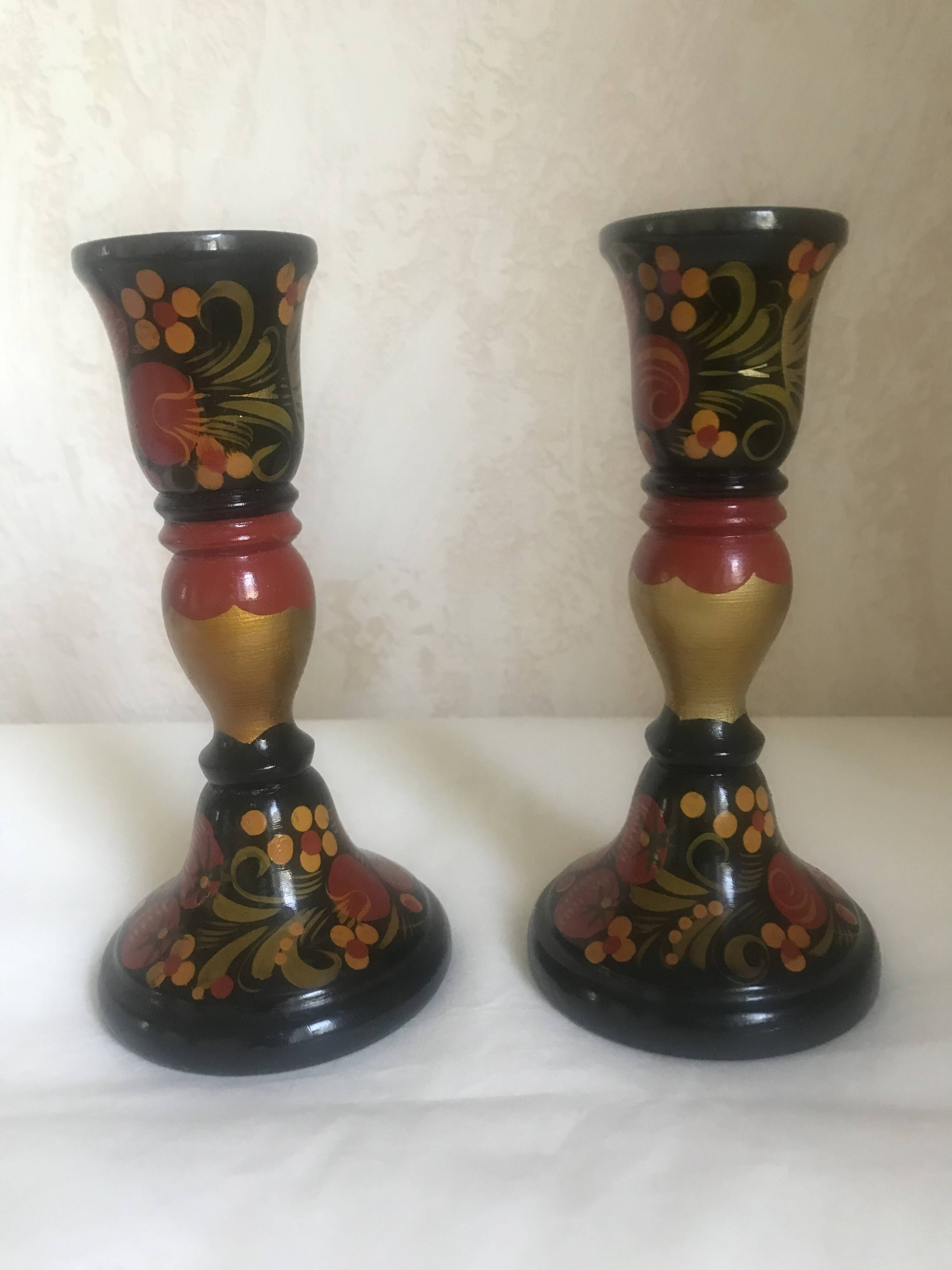Varnished wooden candle holders