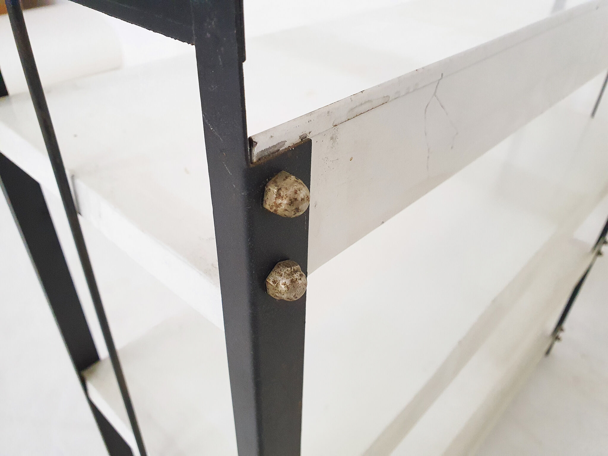 Set of two black and white metal book shelves attrb. to Tomado, Holland, 1950's