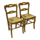 2 solid wood and straw dining chairs