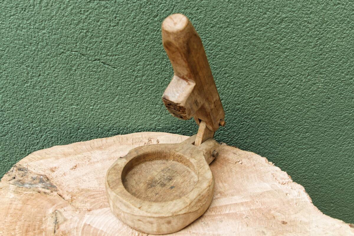 Savoyard brutalist wooden nutcracker, popular art