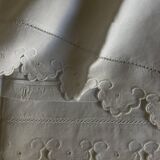 Pair of 19th century linen thread pillowcases embroidered with scallops