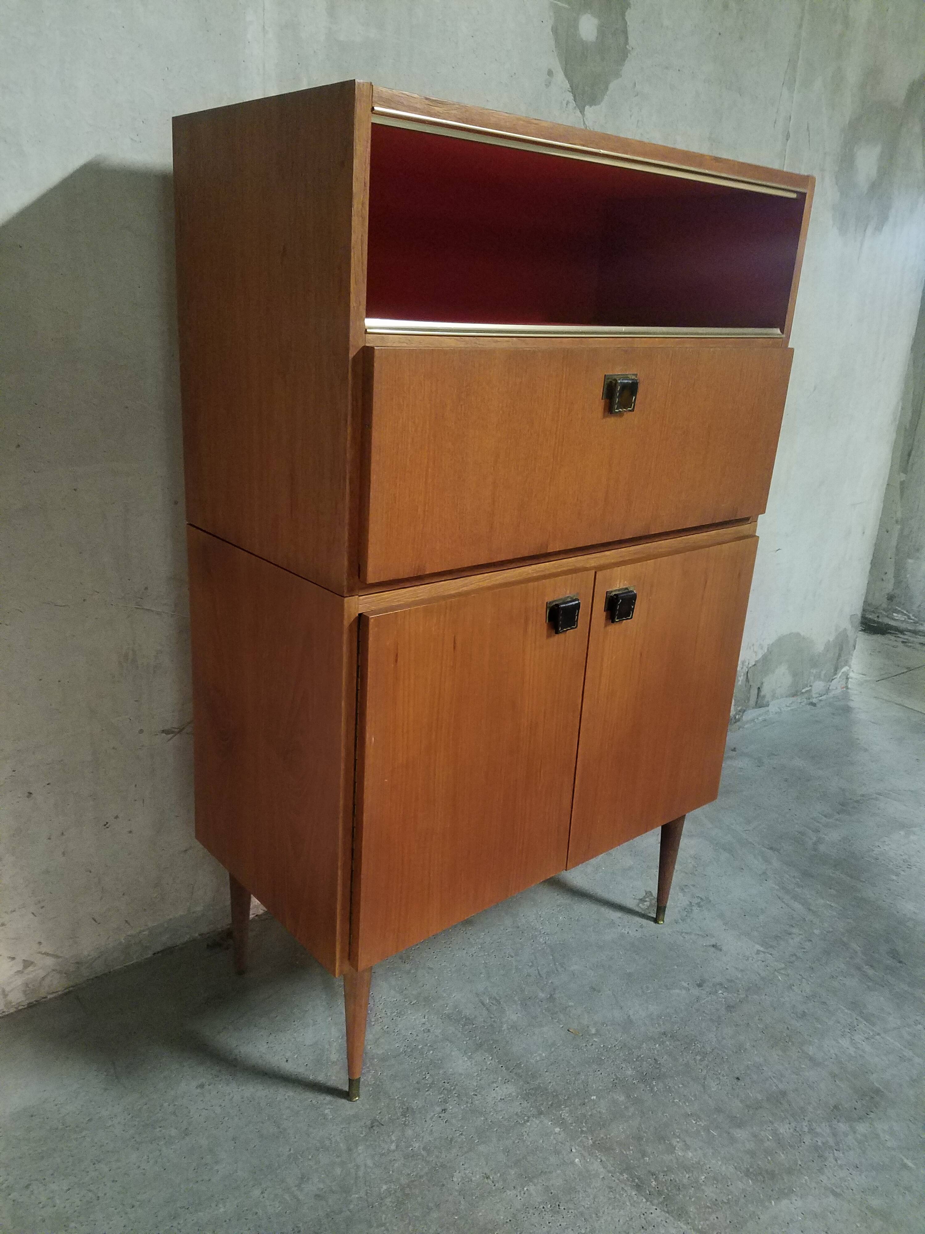 Teak bar cabinet and teak veneer, saddle leather and brass handles