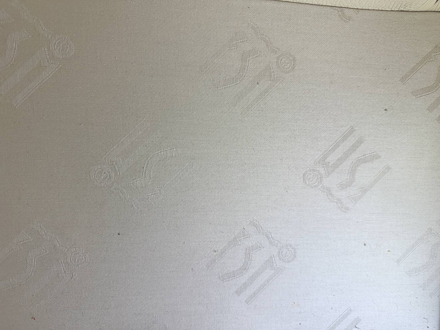 Fauteuil Pavo en cuir crème avec cadre en chrome de FSM, années 2000.