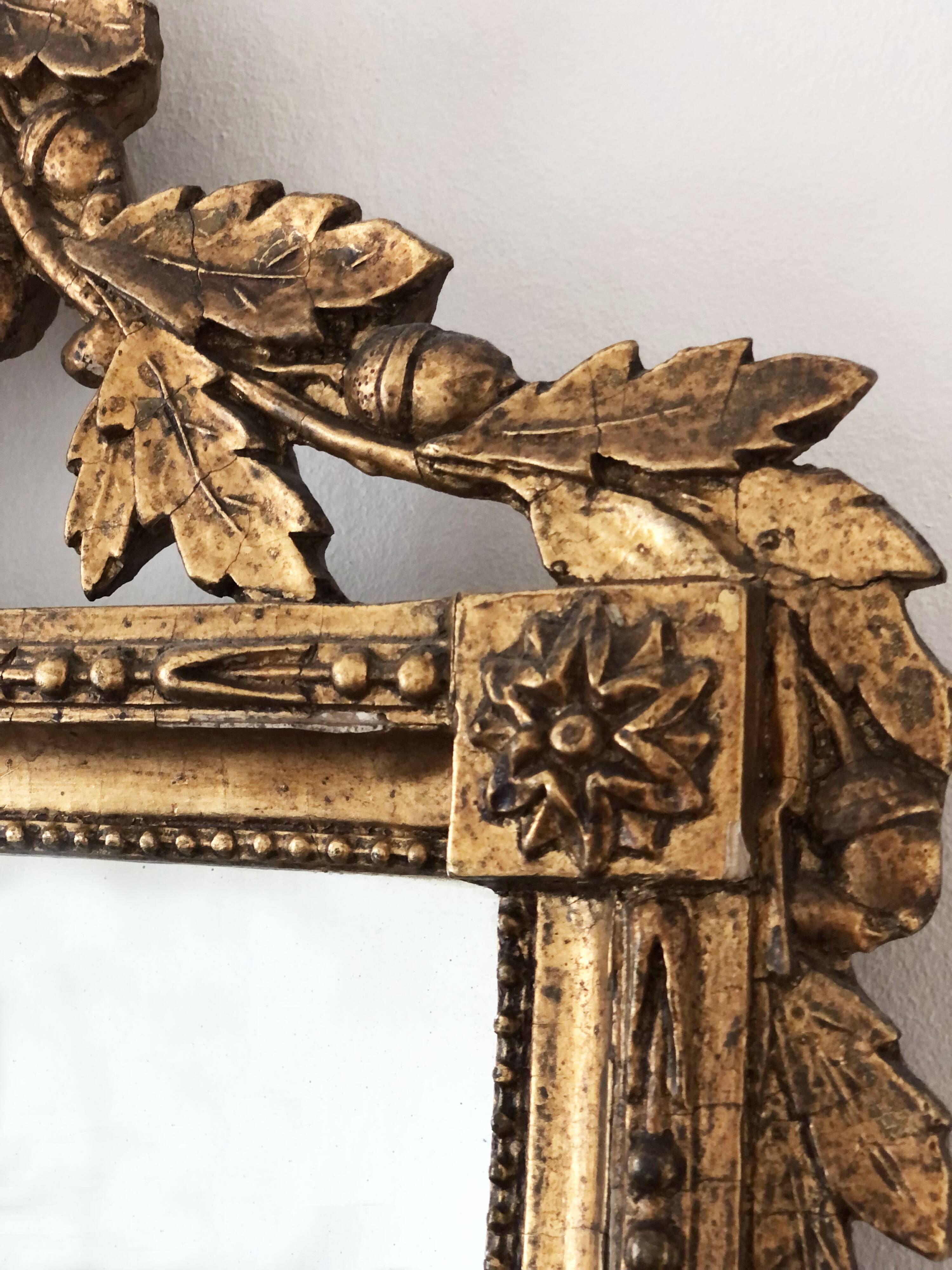 Miroir hollandais Louis XVI en bois sculpté et doré avec verre églomisé du XVIIIe siècle