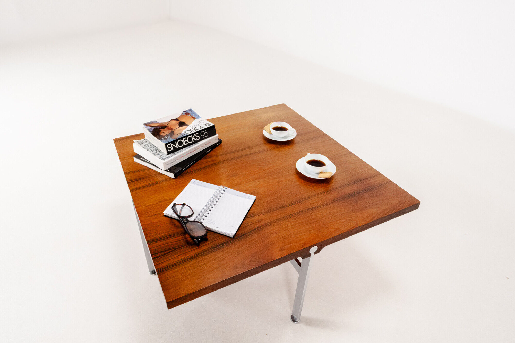 Coffee table in rosewood by Sven Ellekaer