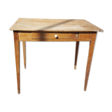 Raw wood farm table with drawer