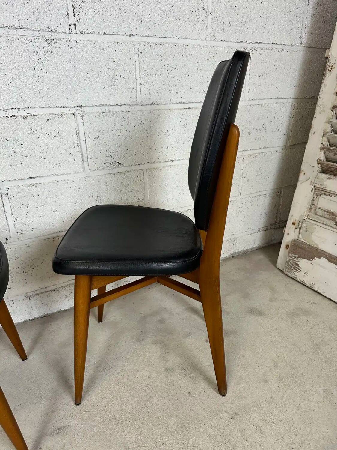 Set of 4 vintage chairs in black leatherette