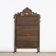 Antique flowered mirror from the 19th century.
