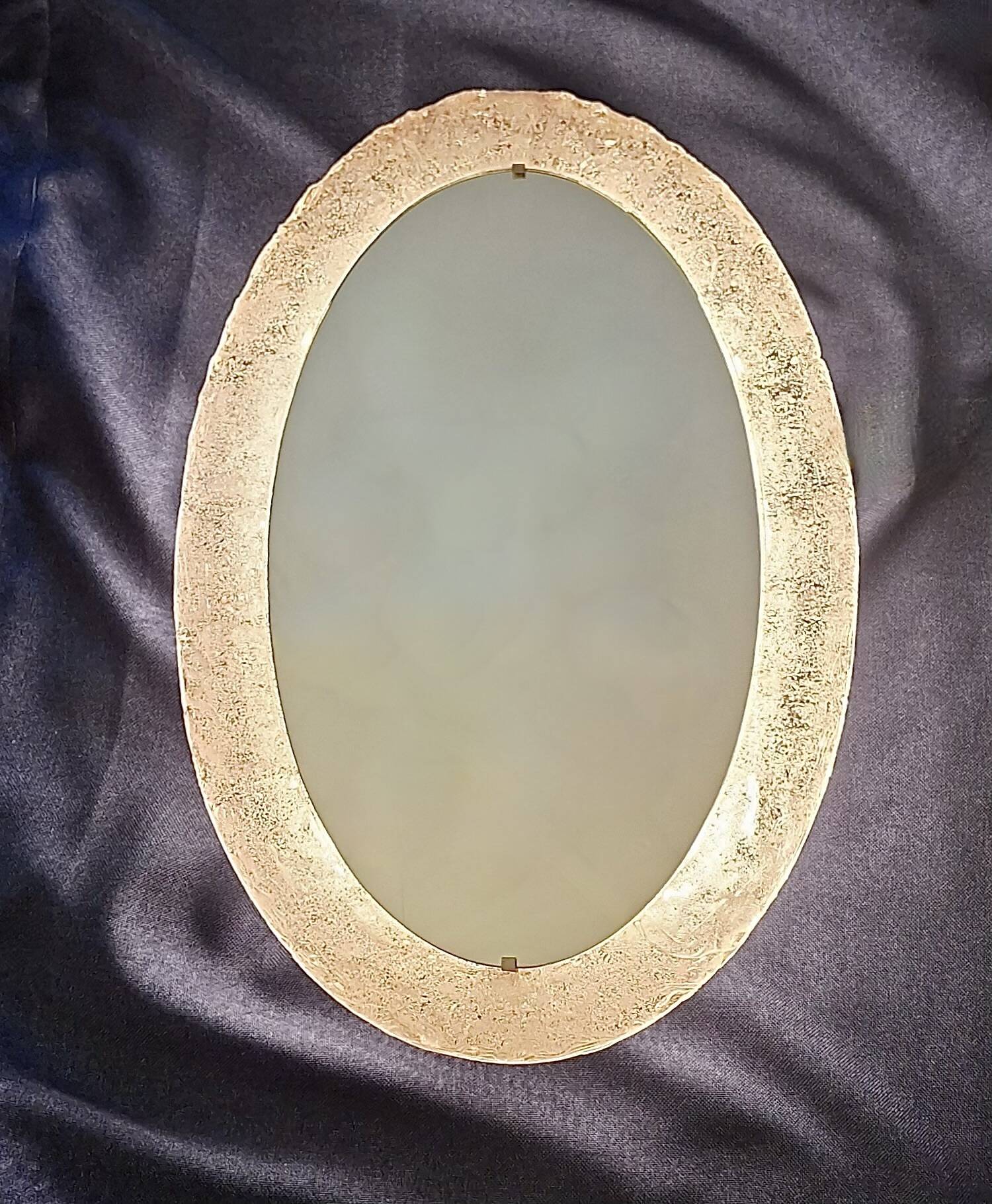 Erco large oval wall light with mirror in melted ice acrylic, 1970s