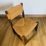 Pair of low wooden and straw armchairs