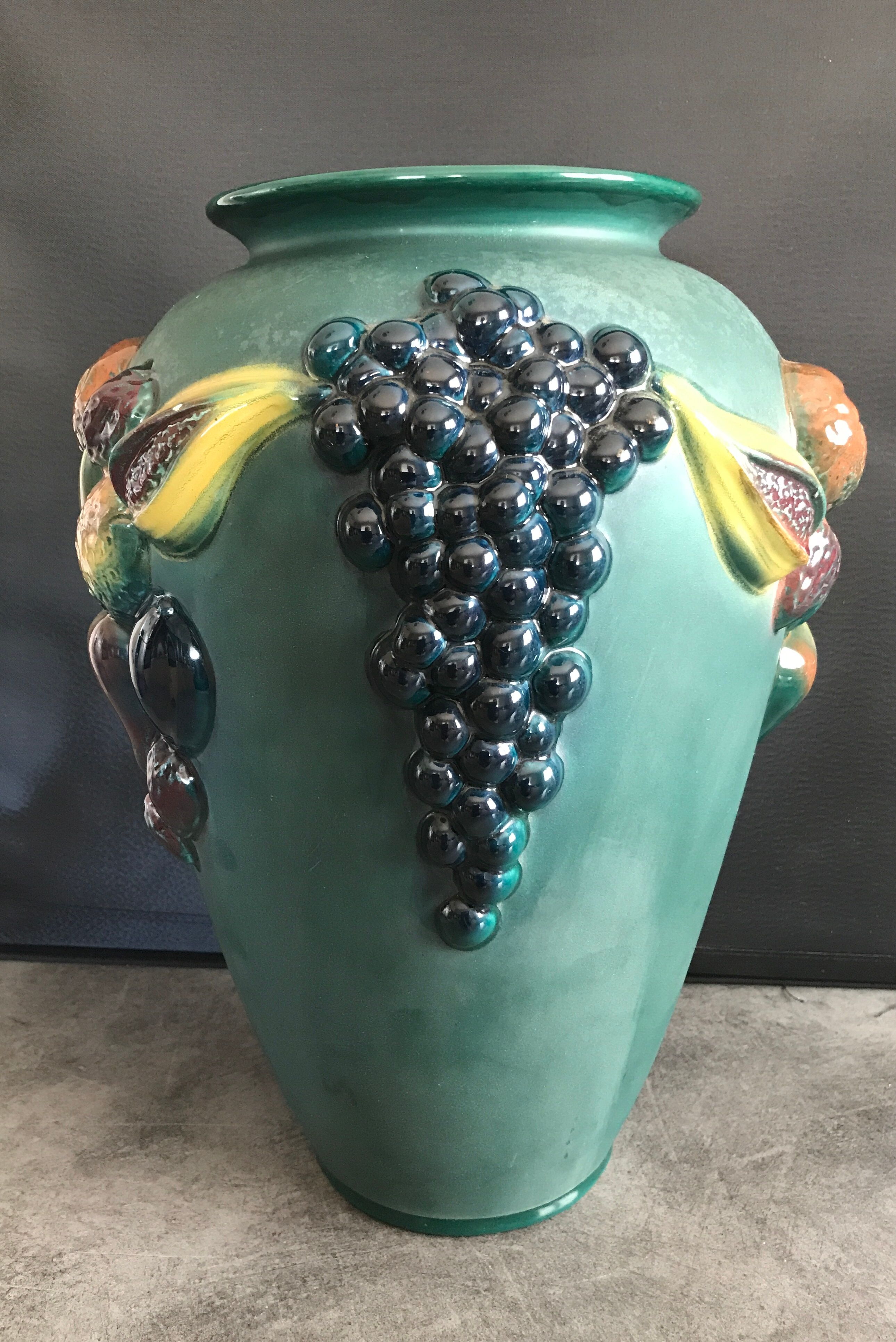 Green ceramic vase with polychrome decoration of fruits and vegetables in relief 33.5 cm