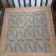 Vintage salon Maison Maugrion in rattan with leather and feather finishes.