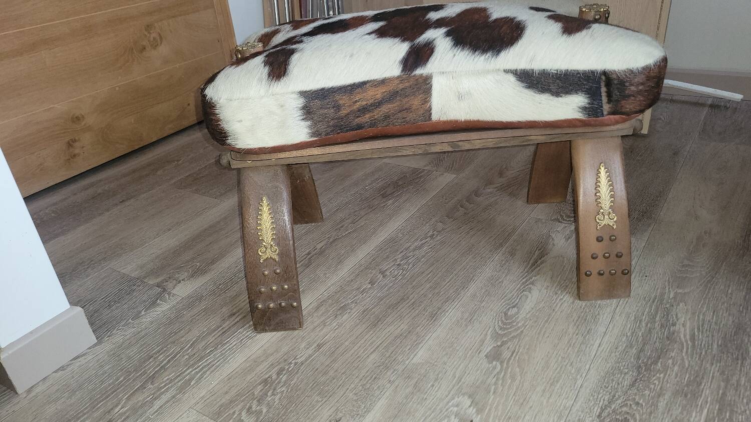 Cowhide and wood stool