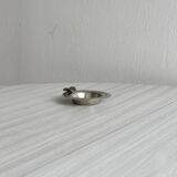 Small ashtray in shiny silver metal