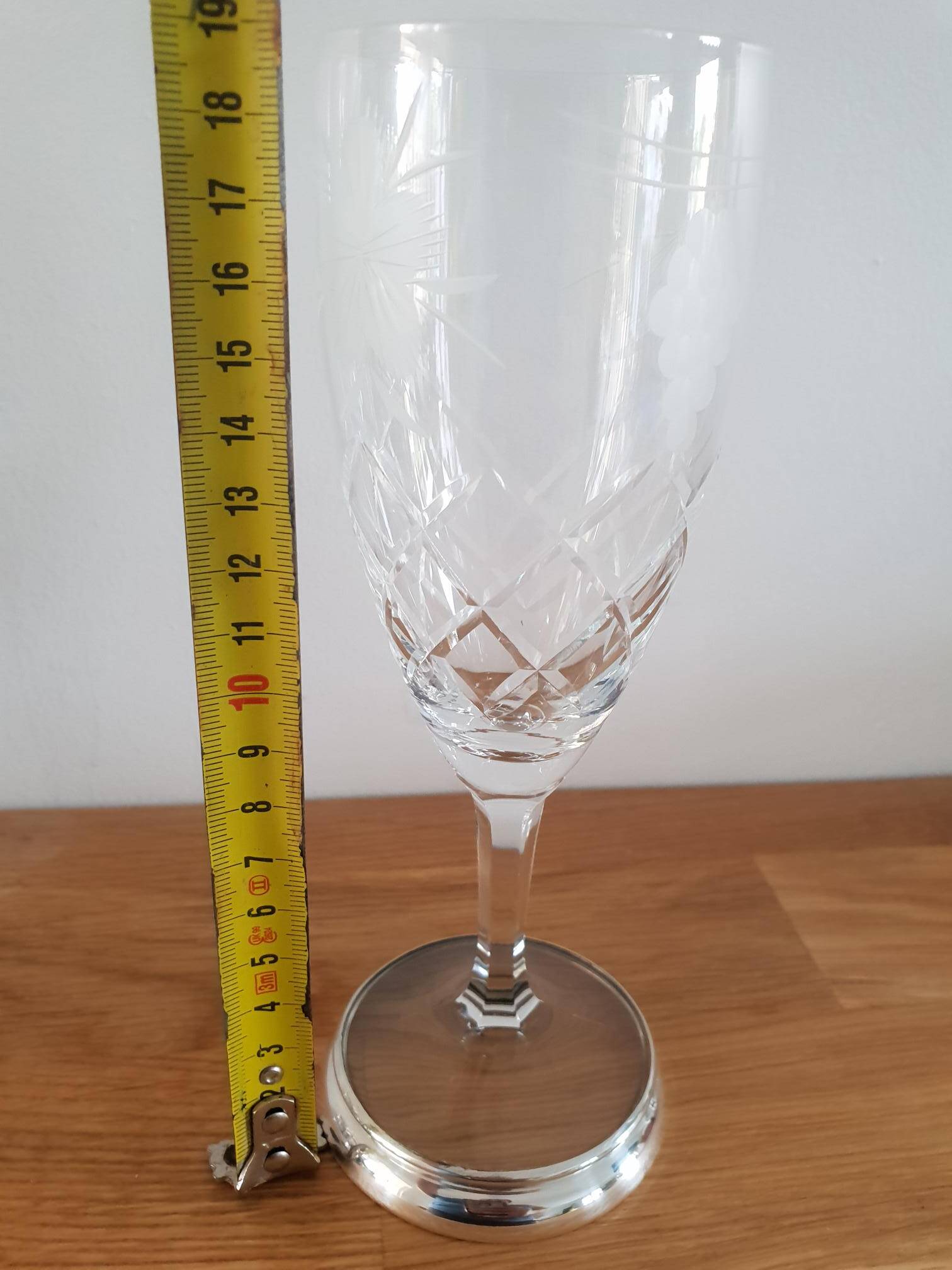 Crystal flutes with a silver rimmed foot