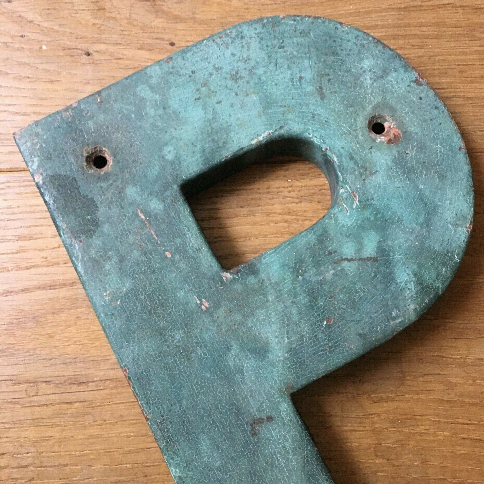Ancient letter sign metal P