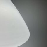White glass pendant " Capsule " designed by Ross Lovegrove for Artemide. Italy 2010