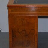 Partner desk in burr walnut designed to conceal computer equipment.