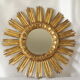 Vintage sun mirror in wood and gold resin 43 cm