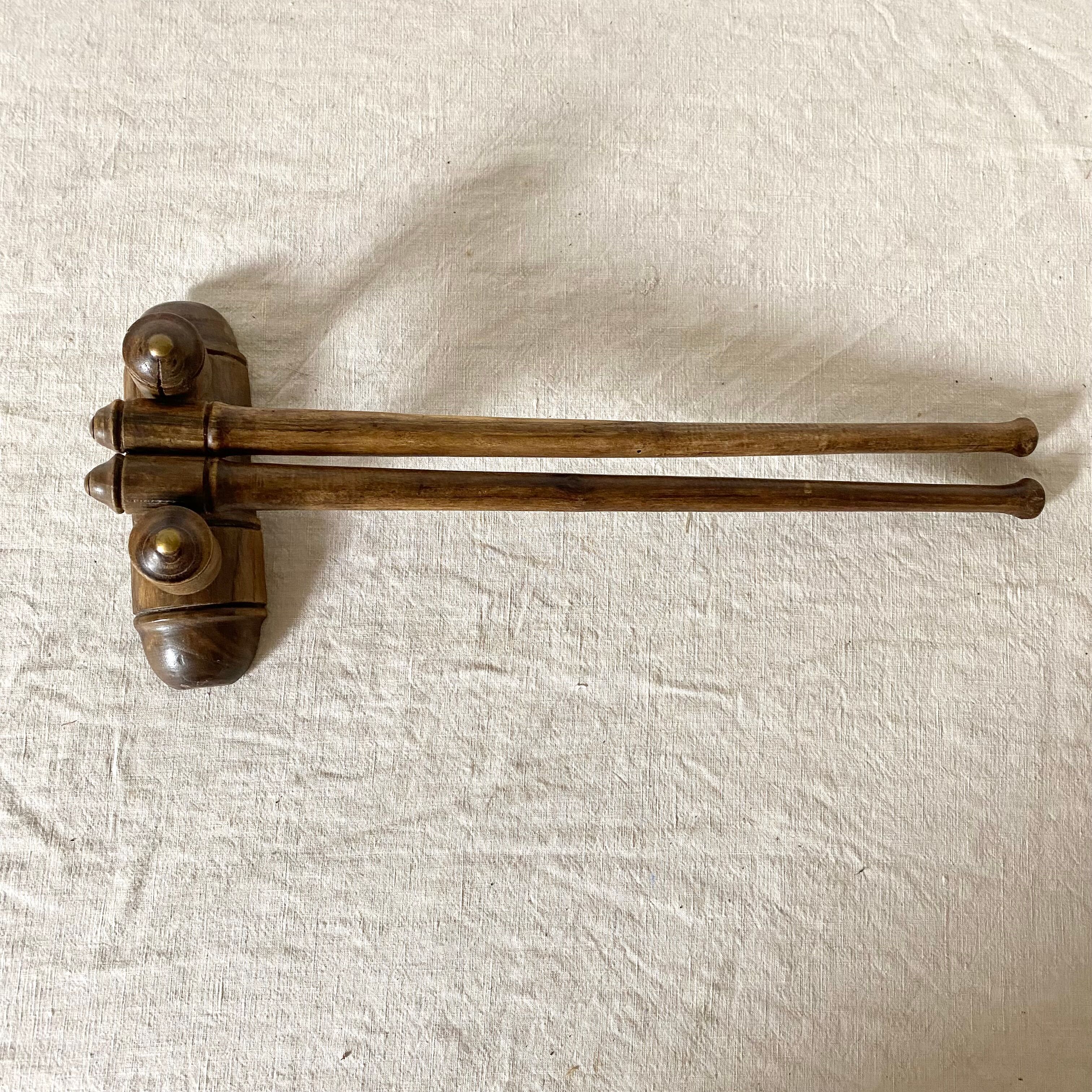 Turned wooden towel rack