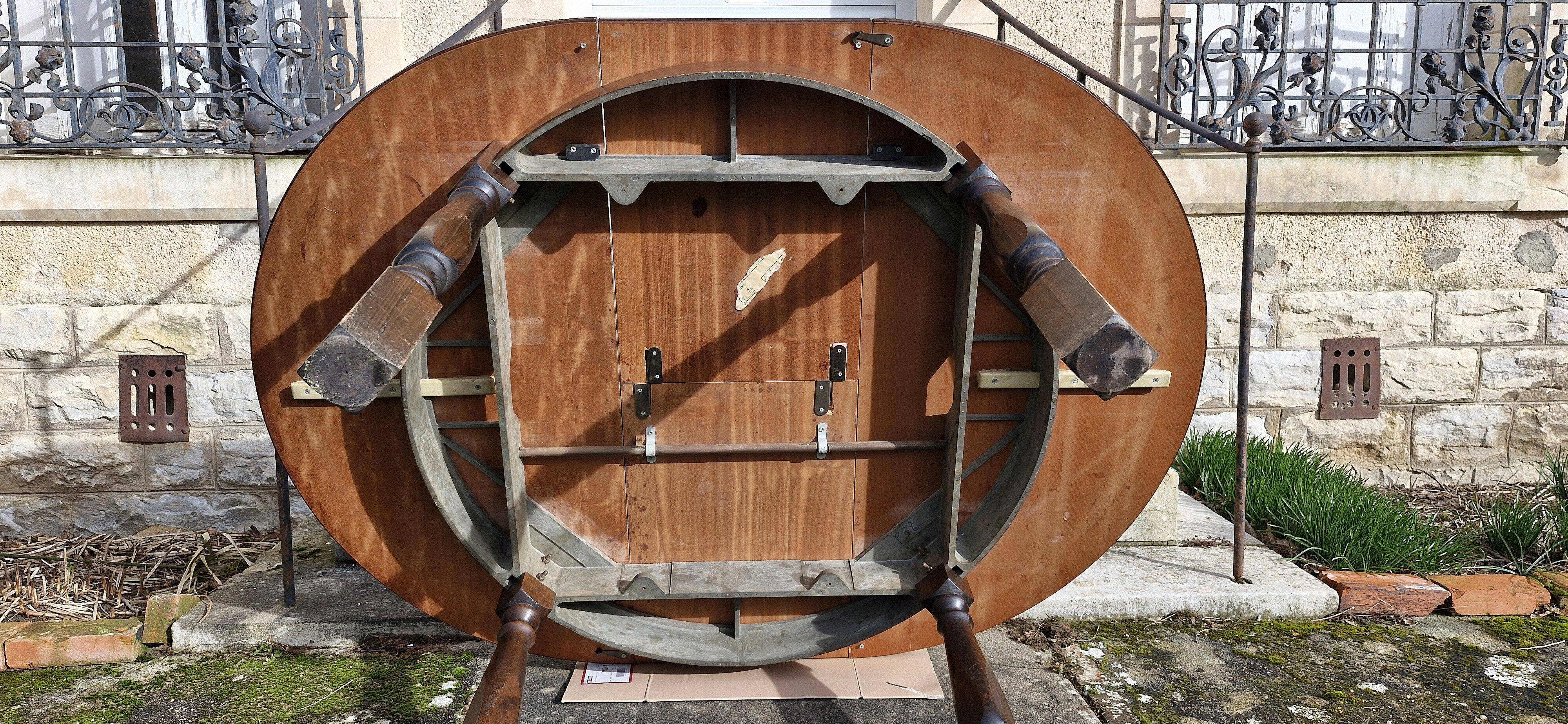 Round wooden table with 1 integrated extension + 6 wooden and fabric chairs