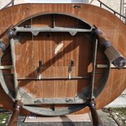 Round wooden table with 1 integrated extension + 6 wooden and fabric chairs