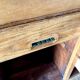Counter, glass-fronted wooden workbench in dark wood, 8 drawers.