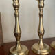 Set of three vintage brass candlesticks