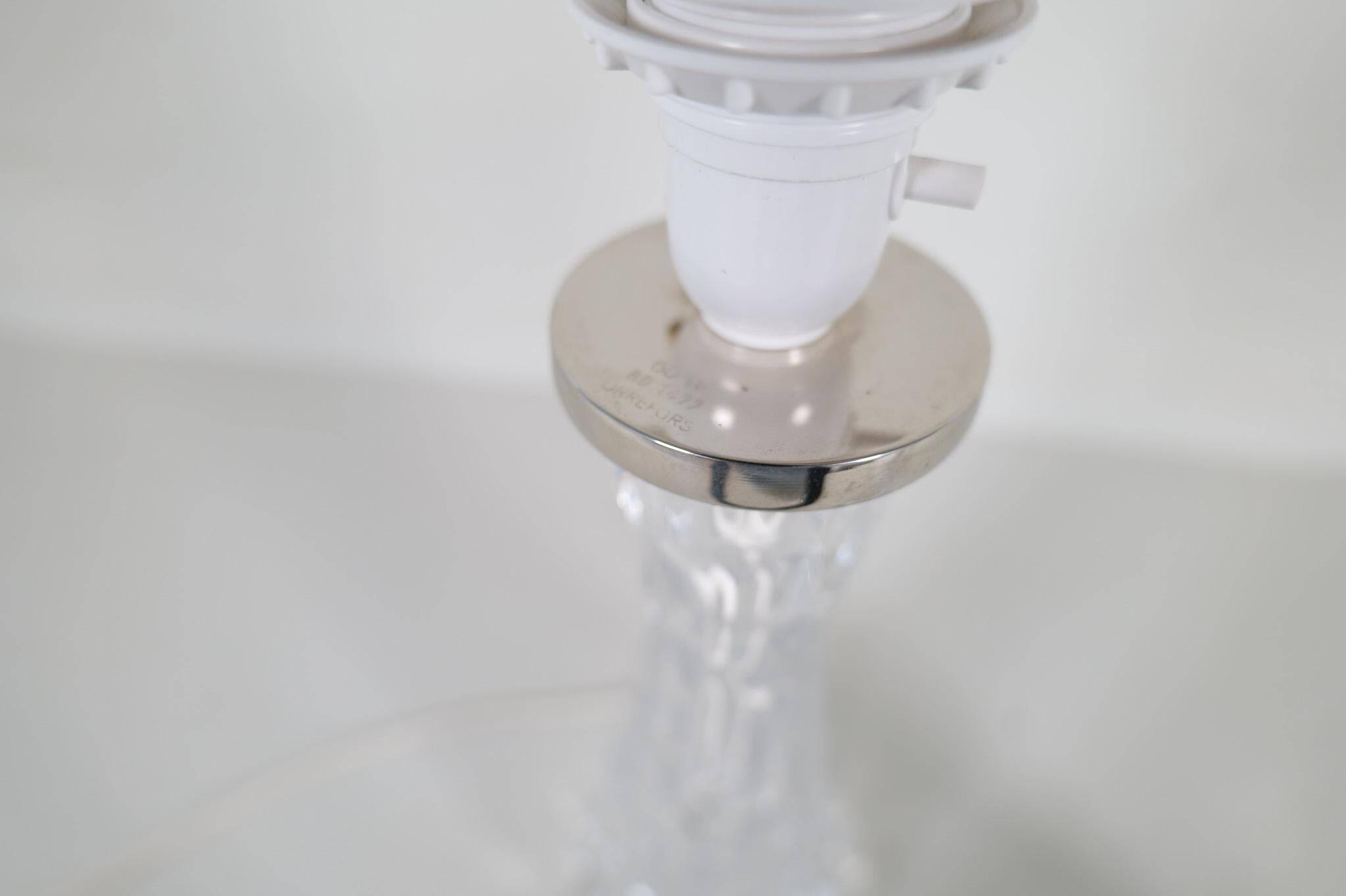 Mid-century modern crystal table lamps by Orrefors, designed by Carl Fagerlund, Sweden, 1970s.