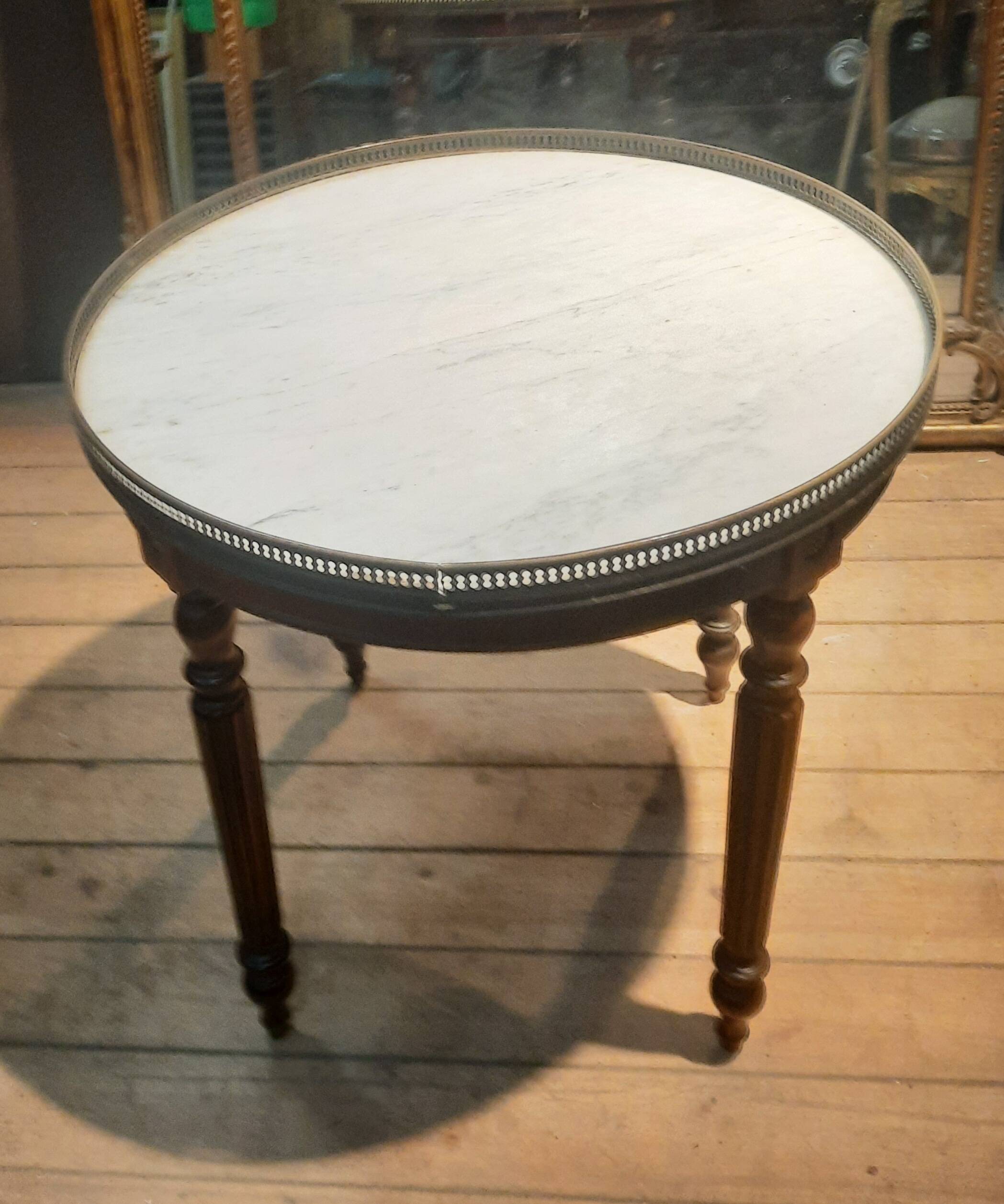 Coffee table with a marble top, known as "bouillotte".