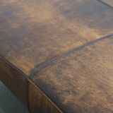 Hocker/coffee table made of sheepskin