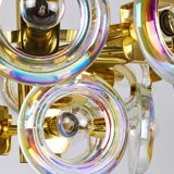 Large brass chandelier by Oscar Torlasco, rainbow optical glass rings, Italy, 1970s.