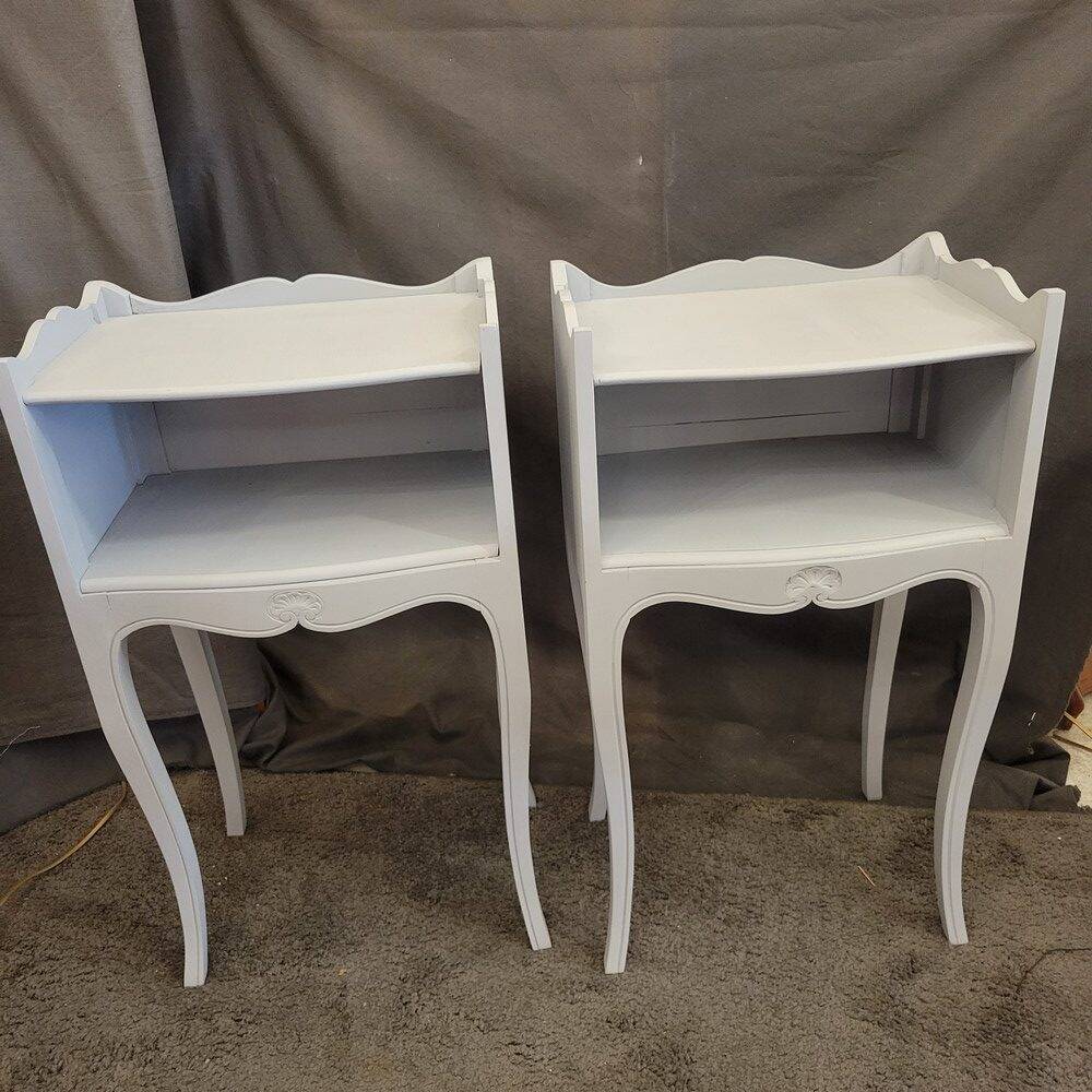 Light grey patinated bedside tables