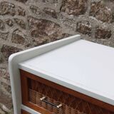 Scandinavian chest of drawers made of wood and rattan