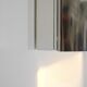 Contemporary wall light in stainless steel and metal.