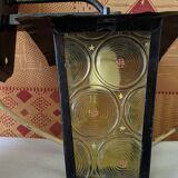 Pretty iron and glass lantern In very good condition black iron color of yellow glass relief circ
